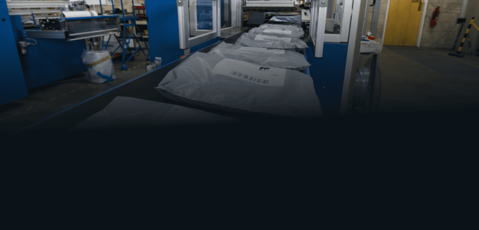 Auto-bagging systems for garments